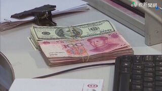 人民幣兌美元持續走強  離岸人民幣一度逼近7