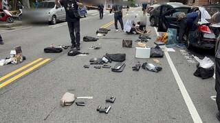 中市警圍捕2男遭衝撞 開1槍壓制起出大批軍火