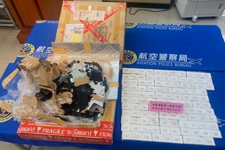 畫框夾藏海洛因快遞闖關 航警逮4人送辦通緝主嫌