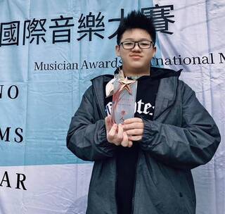 自閉生陳柏睿獲總統教育獎 想成為「基隆周杰倫」