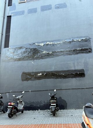 嘉縣強震 嘉市金財神大樓傳外牆龜裂現勘僅塗料剝落