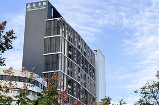 晶華去年賺逾1股本 擬超額配息約14元