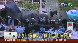 香港入夜大雨 20萬人撐傘守現場