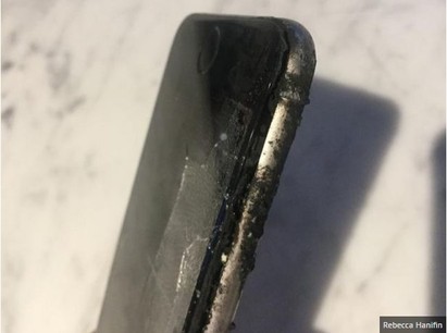 肌肉單車男這一摔 iPhone6竟爆炸自燃! | 爆炸後的iPhone 6。(翻攝鏡報)