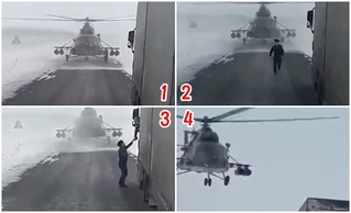 哈薩克軍用直升機"迷路" 停高速公路擋車問路!