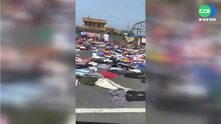 廟前空地"躺"百件衣褲 詭! 卻見嘸人影...