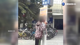 男吻選戰看板惹議 議員候選人:感謝支持