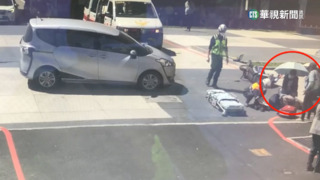 老夫妻車禍重傷倒地　居民暖心撐傘助遮陽
