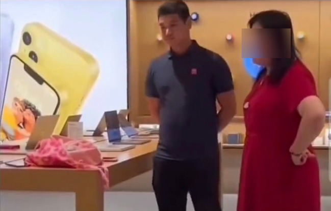 中國婦人闖蘋果店背誦《滿江紅》　抽考路人背詩還嗆：用iPhone都漢奸 | 華視新聞