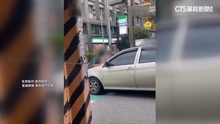 醉男檢舉違停　與車主衝突竟趴「引擎蓋」擋車