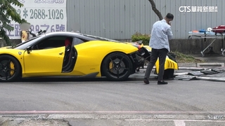 駕超跑闖火場糗了！　保險桿脫落.輪壓消防水線