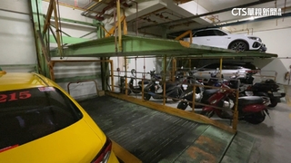 不知機械車位有人？　婦按「停車鍵」害鄰居車損判賠3萬6